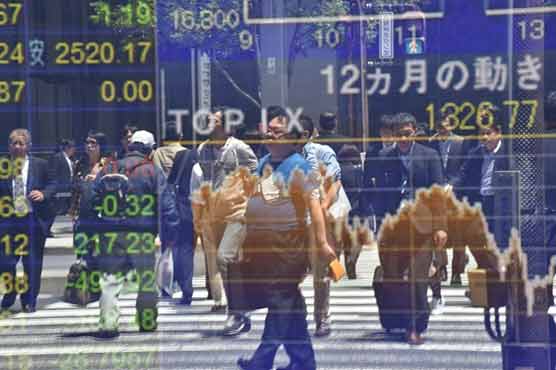 Asian markets down after Wall St losses, but Tokyo rallies
