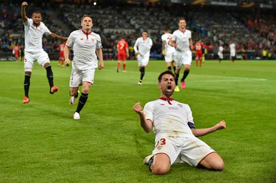 Football: Coke breaks Liverpool hearts in Europa League triumph