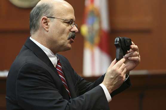 US killer wraps up auction for gun used in black teen's slaying