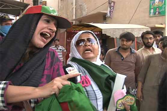 PTI woman worker thrashes another woman before rally's commencement