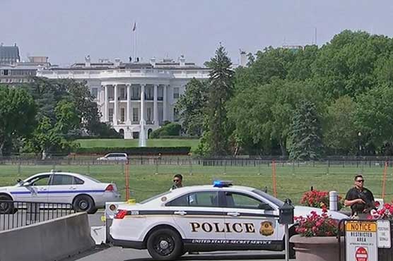 Armed man shot outside White House
