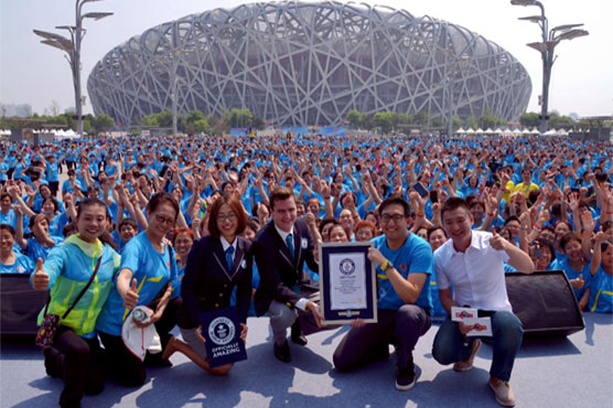 In sync: Over 31,000 in China set world dance record