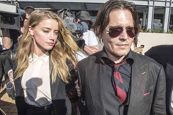 Depp, Australian minister renew war of words