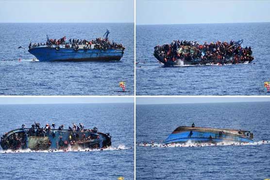 Striking pictures capture moment of migrant shipwreck off Libya