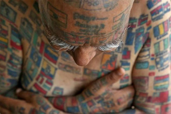 For world records, Indian man removes teeth and gets over 500 tattoos