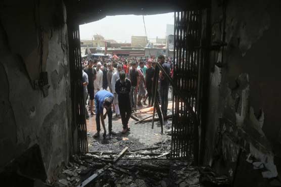 IS-claimed suicide attack kills 7 in Iraq cafe