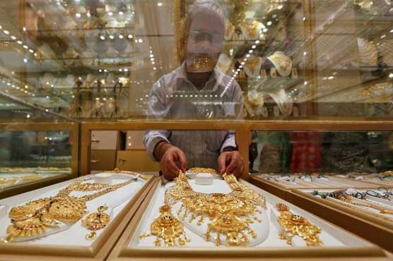 Gold inches up but heading for biggest monthly decline in six