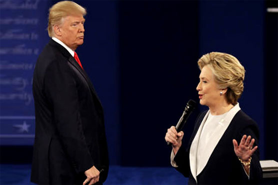 Clinton on the attack as US race narrows