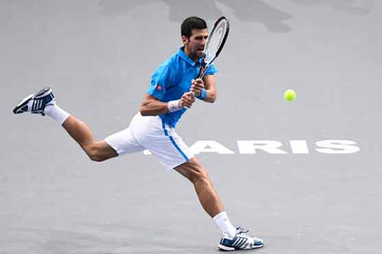 Djokovic eases into Paris Masters last 16