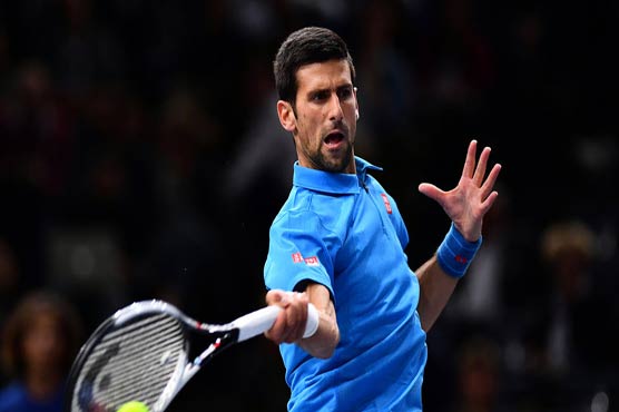 Djokovic comes back from one set down to reach last 8