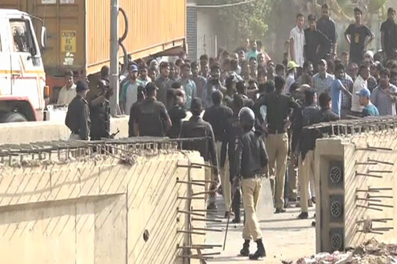 Tension grips Karachi as police clash with religious party's protesters