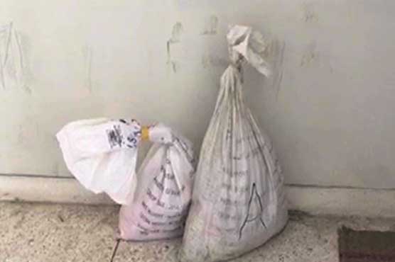 Piece of evidence: Police place bags of explosives at court's corridor