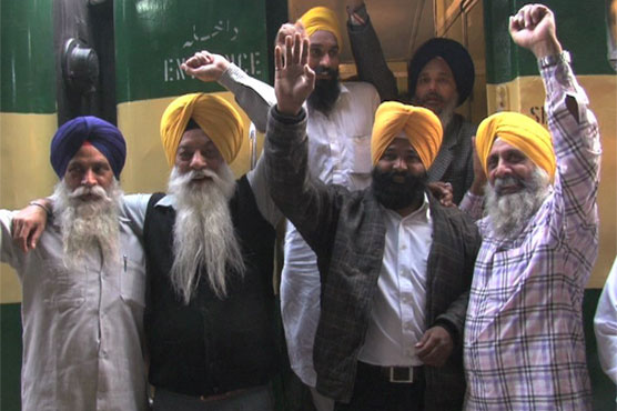 Sikh pilgrims return to India after attending Baba Guru Nanak's birth celebrations