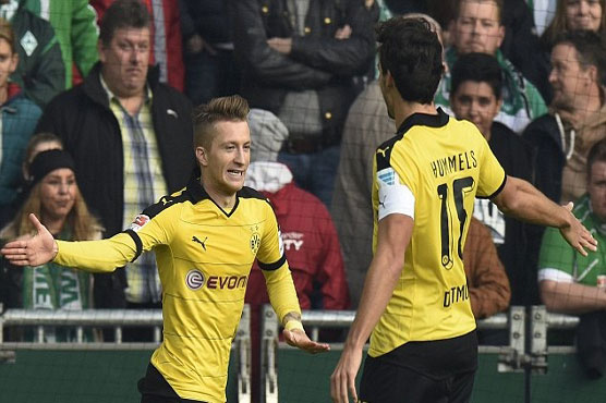 Football: Comeback king Reus hits hat-trick in record haul