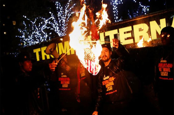Trump flag-burning tweet leads activists to burn some flags in New York