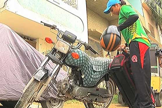 Pakistan's woman cricketer Sana Urooj uses bike to reach stadium for practice