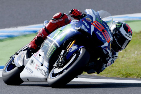 Motorcycling: Champion Lorenzo sets pace in Japan