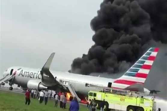 Eight injured in plane fire at Chicago airport