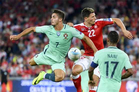 Football: Portugal beaten in World Cup opener, France held