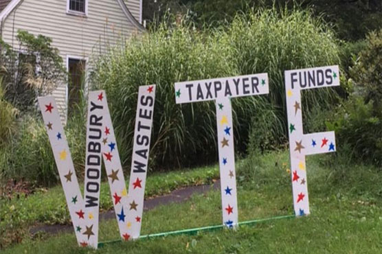 Neighbors, town officials cry foul over 'WTF' sign on lawn