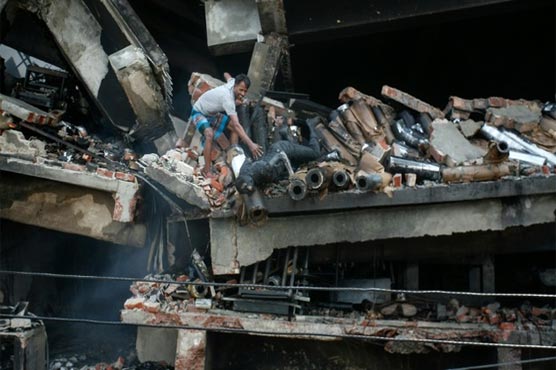 Bangladesh struggles to search factory after deadly fire