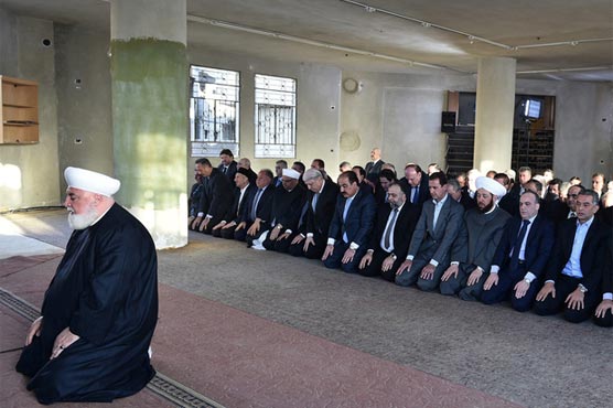 Syria's Assad at Eid prayers in town surrendered by rebels