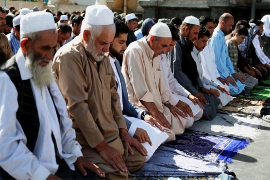 Afghans mark Eid with prayers for peace