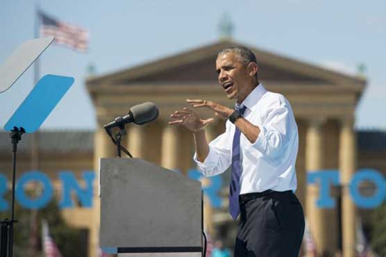 Obama hits at 'unfair' criticism of Clinton