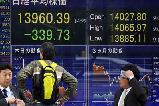 Tokyo shares open lower