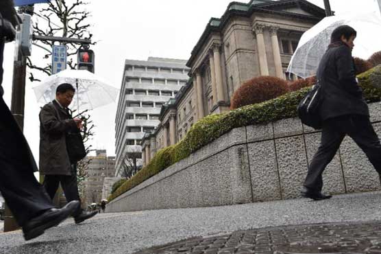 Asian traders cautious ahead of bank meetings