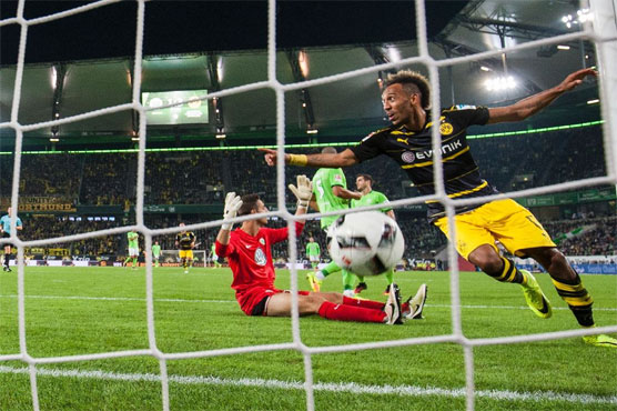 Football: Dortmund rout Wolfsburg to go top in Germany