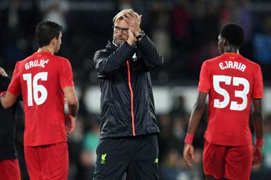 Klopp urges patience as Liverpool thrive