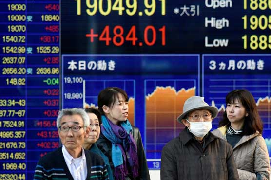 Asian traders step back after Fed-fuelled rally