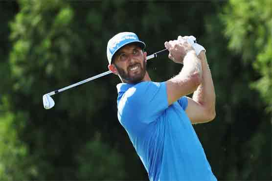 Golf: Johnson leads Tour Championship as injured Day withdraws