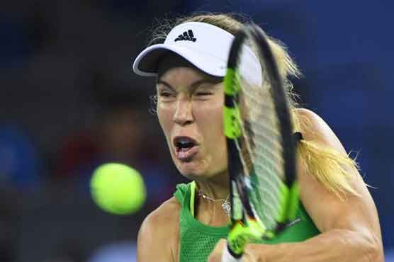 Tennis: Wozniacki makes strong start at retirement-hit Wuhan