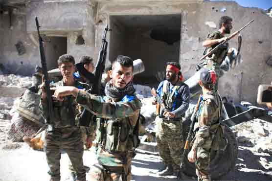 Syrian army retakes Aleppo district as bombs rain down