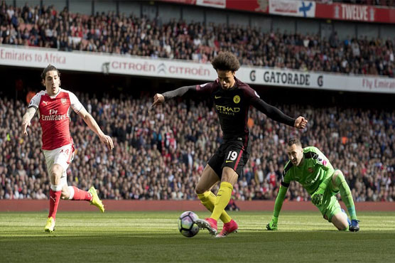 Football: Respite for Wenger as Arsenal hold Man City