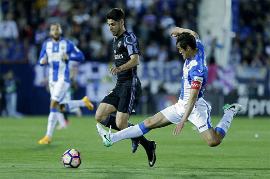 Football: Morata helps Madrid keep Messi-inspired Barca in check