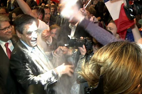 French presidential candidate hit with flour in face