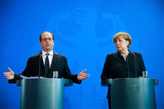 Merkel, Hollande voice support for US strike against Assad