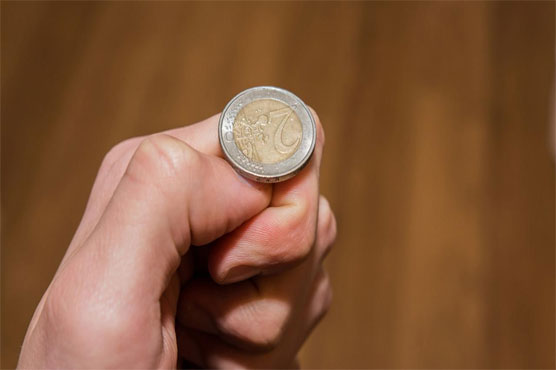 Coin toss to determine next leader of Illinois village