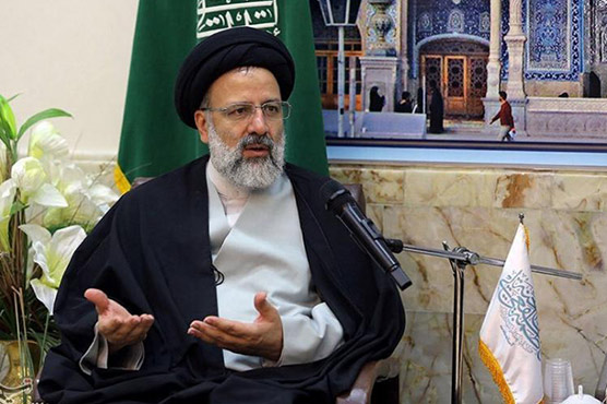 Rouhani, hard line rival register for Iran elections 