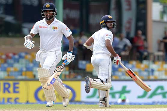 Karunaratne, Mendis resist rampaging India
