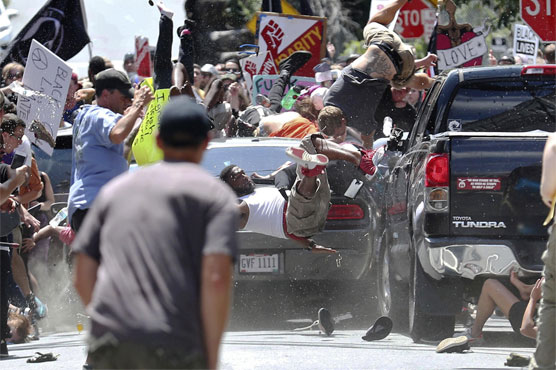 One dead at US far-right rally, Trump blames 'many sides'