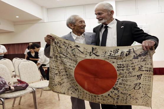 A fallen soldier's flag returned to his family after 72 years