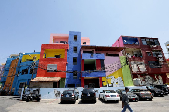 Street art brings colour to rundown Beirut suburb