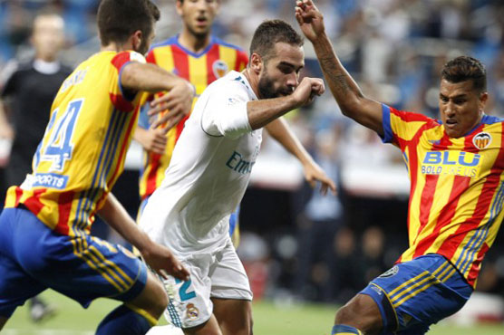 Football: Real streak halted by Valencia draw