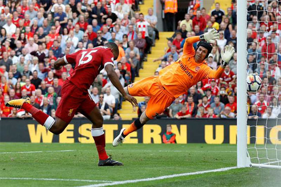 Football: Liverpool thrash Arsenal, Wood rocks Spurs
