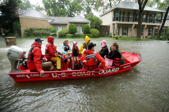 Houston races to rescue flood victims before storm's return