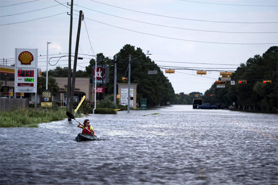 Texas flood toll mounts amid chemical blast fears